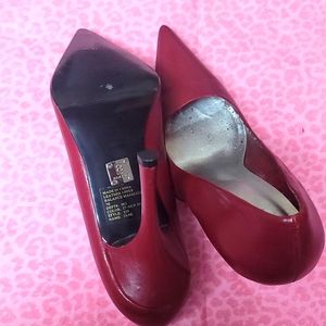 Maroon bakers pumps heels.  Worn outside still in wearable condition.